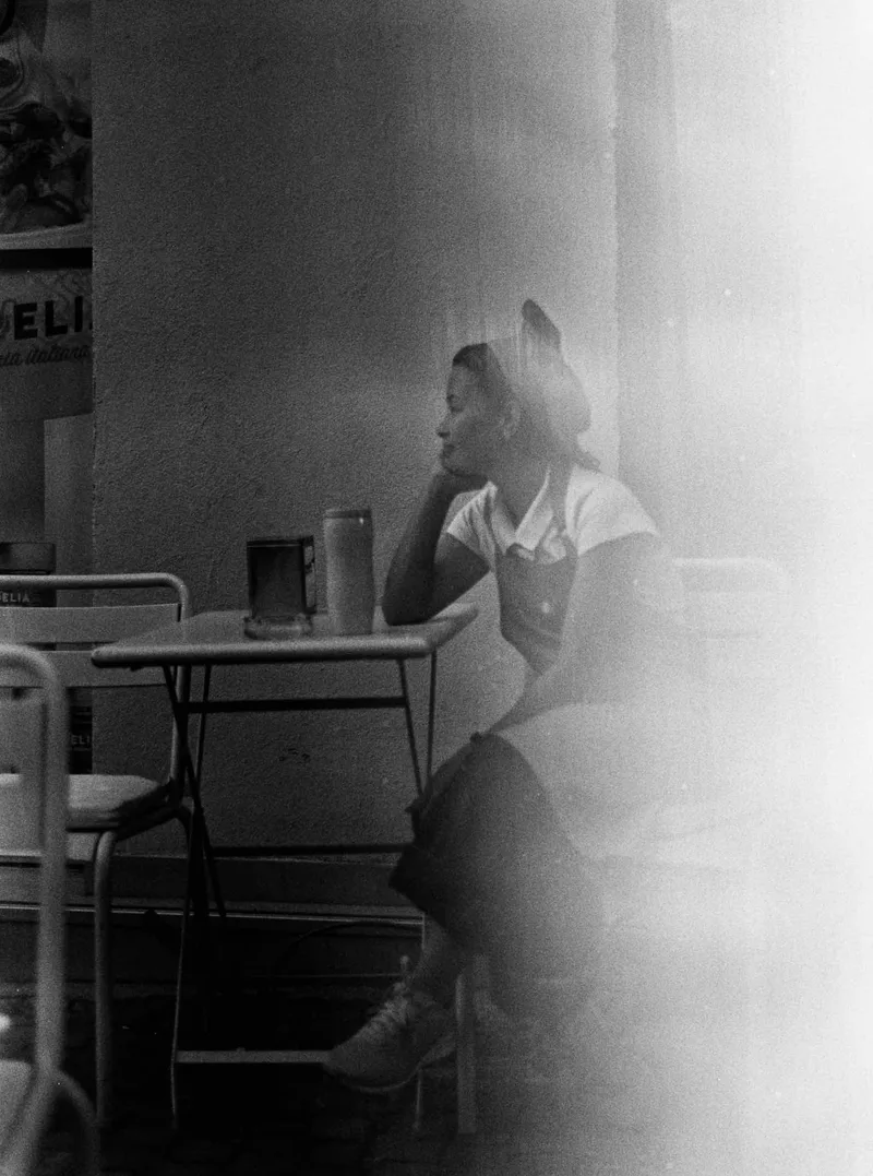 Subtle smile shot on Foma Fomapan R100 with a Ricoh KR-10, developed at Home / Self-Developed, by marius.iordache
