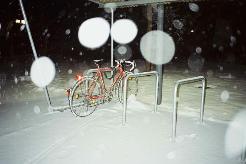 bike + snow shot on Kodak Vision3 250D with a Olympus AF-1, developed at Deivids Film Lab, by laurenz