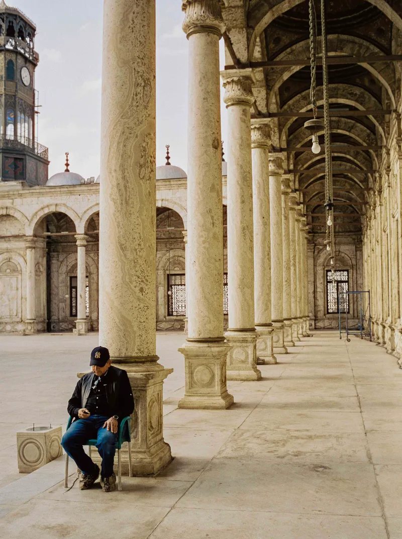 Rest Break at Muhammad Ali Mosque shot on Cinestill 50D with a Voigtländer Bessa R4A, developed at The Photo Spot, by Richard Vialet, ASC
