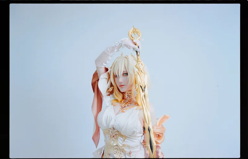 Honkai: Star Rai Aglaea shot on Kodak Portra 160 with a Canon EOS 1N, developed at natsusomarre Photograph, by momotarou