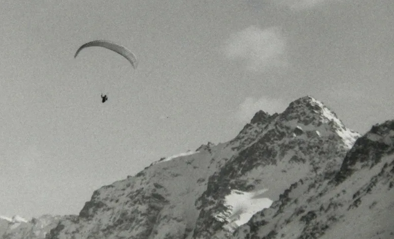 Paraglider over Flat Top II shot on Flic Film UltraPan 400 with a Minolta SR-T 101, developed at Home / Self-Developed, by Truckinwagen