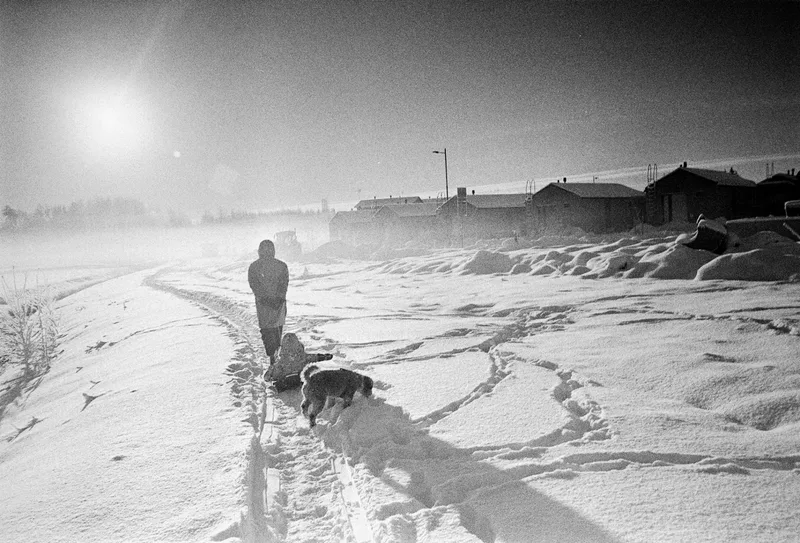 Sun, snow and shadows. shot on Santa film Santa Rae 1000 with a Olympus XA, developed at Home / Self-Developed, by tuukka