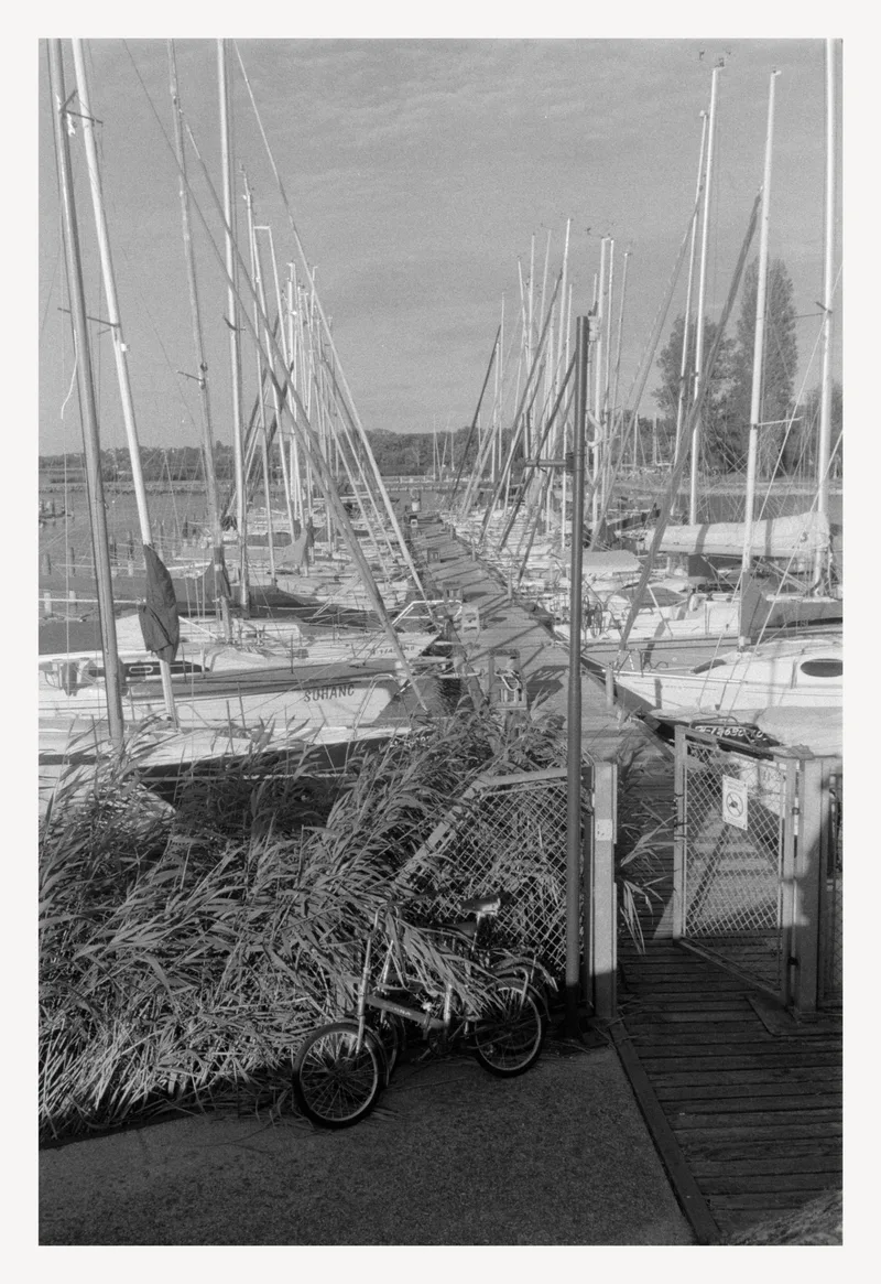 Afternoon Lights on the Pier shot on Agfa APX 400 with a Olympus AF-1, developed at Home / Self-Developed, by AkosArnold
