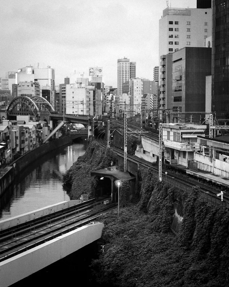 Tri-level train crossing shot on Ilford Delta 400 with a Pentax Program A, by ant