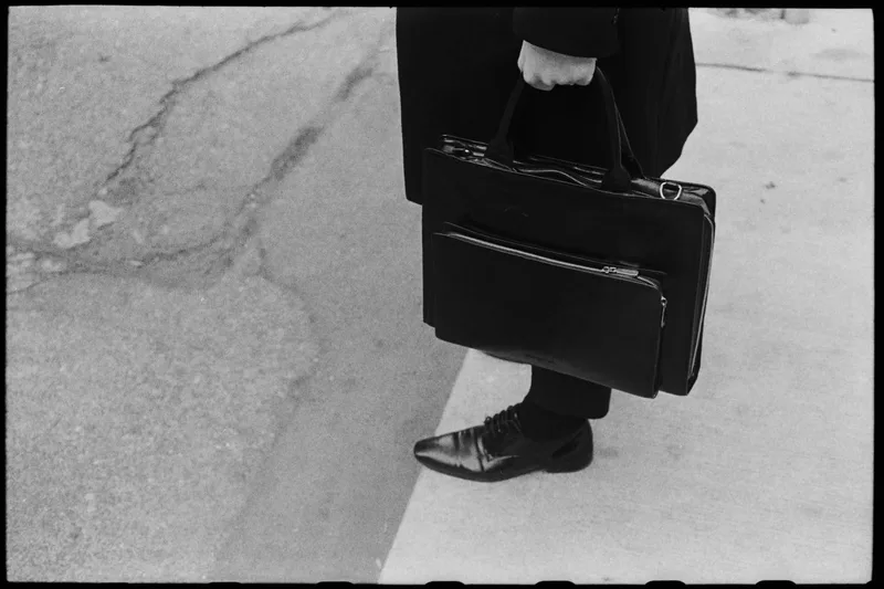 Standing on business shot on Kodak Tri-X 400 with a Leica IIIC, developed at Home / Self-Developed, by OCWood