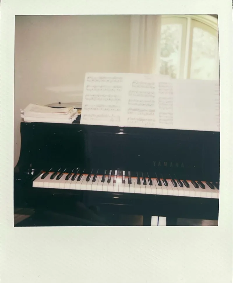 mom's piano shot on Polaroid i-Type with a Polaroid Flip, by kai