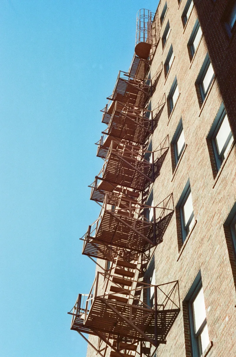 fire escape in SATX shot on Fujifilm FujiColor C200 with a Minolta Hi-Matic E, developed at San Marcos Film Lab, by HB/FRANKENPAN