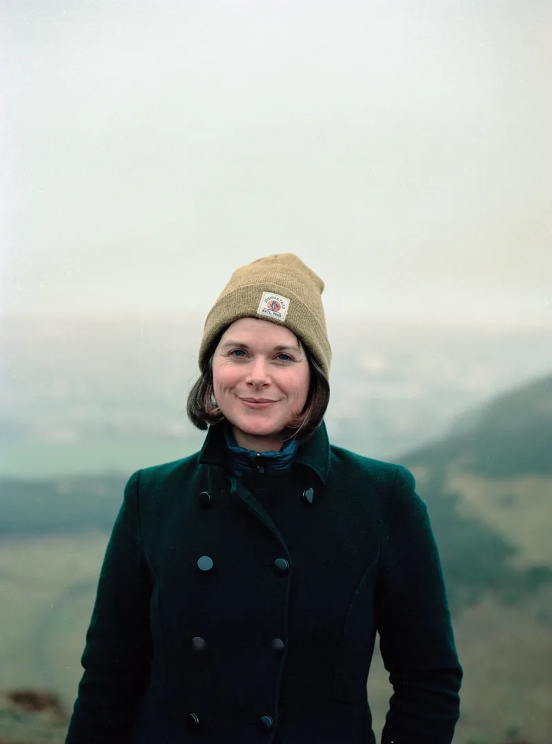 Catie on Arthur's Seat shot on Kodak Portra 160 with a Mamiya 645 Pro TL, by Benjamin