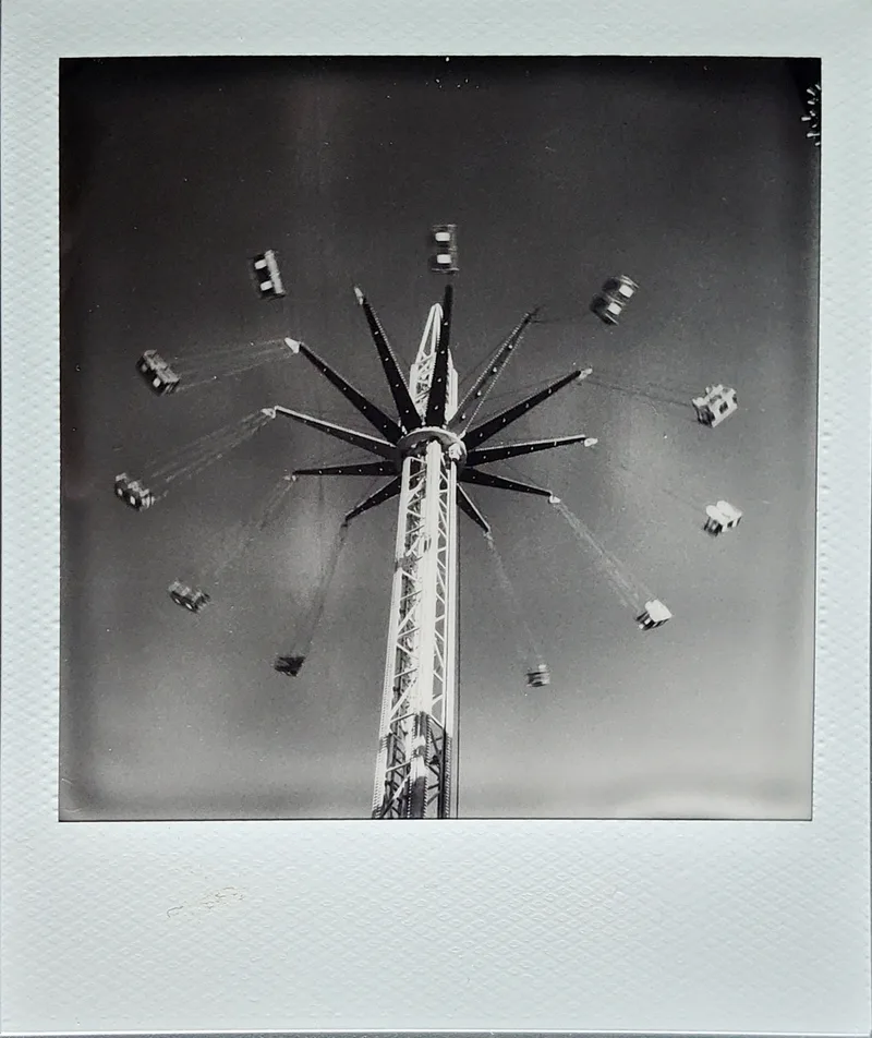 Enjoy the ride 🎠shot on Polaroid B&W i-Type with a Polaroid I-2, by Guesty
