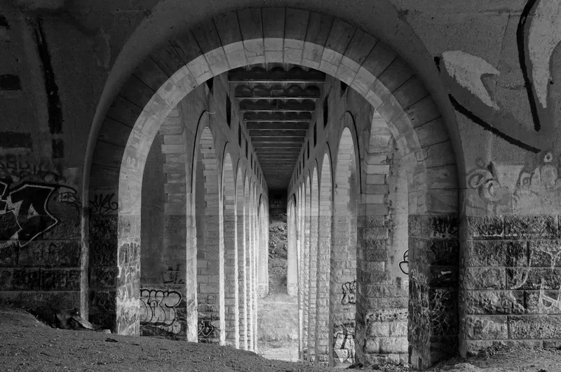 Arches shot on Kodak T-Max 100 with a Olympus OM-4T, developed at Indie Photo, by alexonkow
